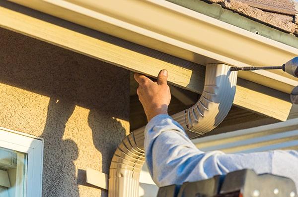 gutter installation involves measuring, cutting, and securing the gutters to the roof edge